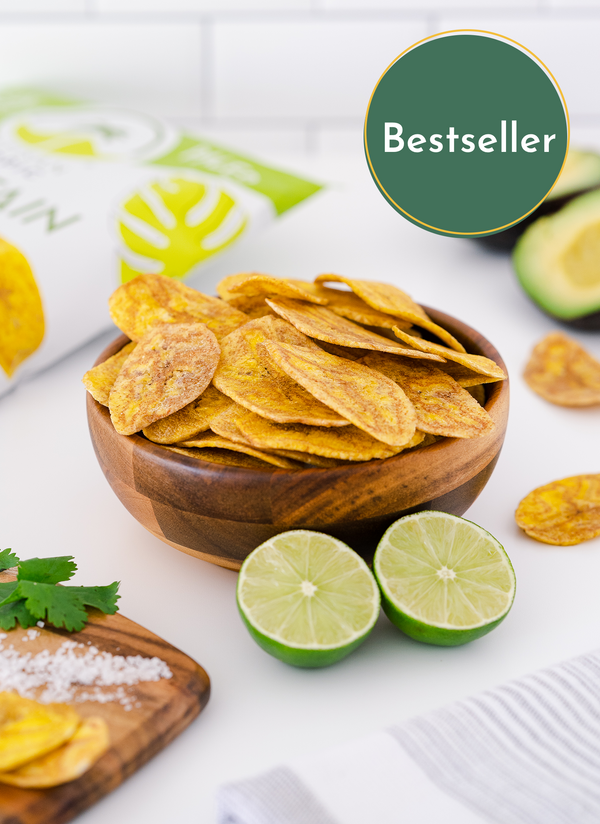 Bestseller Bowl of Artisan Tropic Sea Salt Plantain Strips With Limes and Avocados in the foreground and background