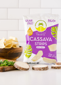 Picture of Artisan Tropic's 2 oz Sea Salt Cassava Strips with raw cassava, cilantro and strips in the background
