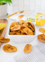 Bowl of Artisan Tropic's 4.5 oz Naturally Sweet Plantain Strips